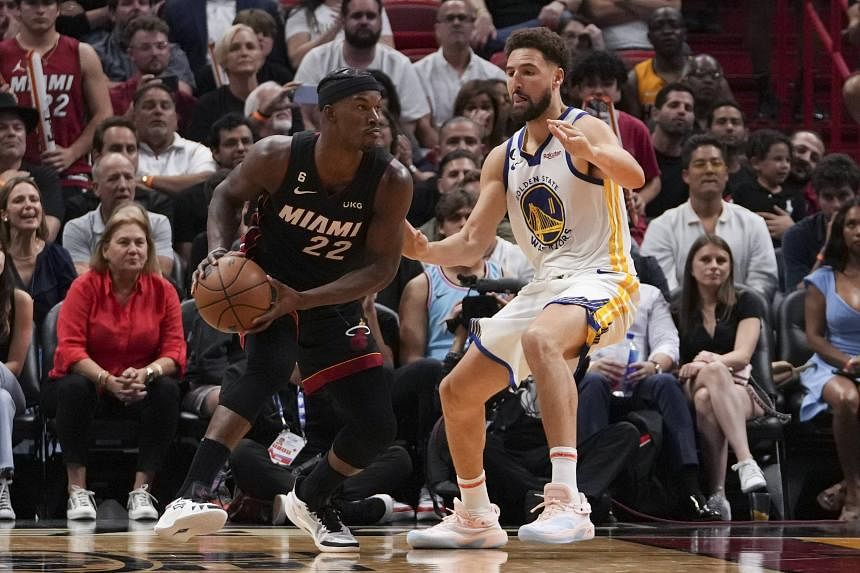 nba:-jimmy-butler,-heat-pull-away-late-to-top-warriors